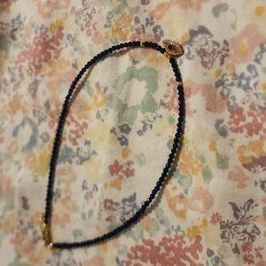 Evil eye necklace. Blue gem.